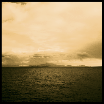 The beautiful sepia toned picture of the sea draws you in
